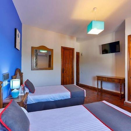 Hostal Alfonso XI Гвадалупе Экстерьер фото